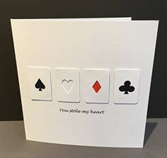 a card with four playing cards on it