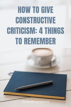 a notebook, pen and cup on a table with the words how to give constructive critiism - 4 things to remember