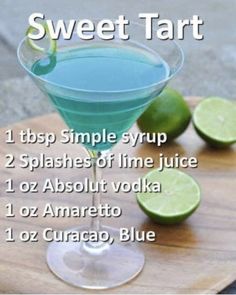 a blue drink with limes on the side and text that says sweet tart