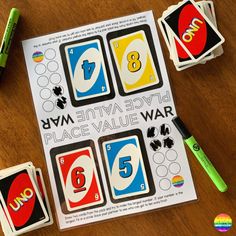 an unopened card game with numbers and symbols