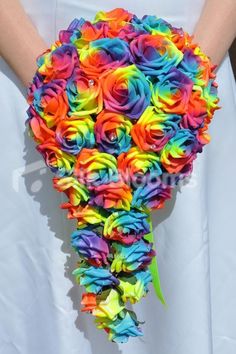 an image of a bouquet made out of rainbow roses