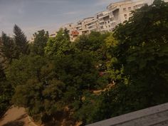 an aerial view of some buildings and trees