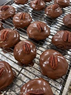 chocolate pecan cookies cooling on the grill