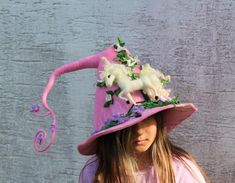 Pink Unicorn hat, felted sauna hat, costume hat, larp hat, birthday party hatThis special, handmade felted sauna hat model is unique, but most important detail on it is..– Unicorn –Legendary creature that has been described since antiquity as a beast with a single large, pointed, spiraling horn projecting from its forehead. He is often considered the most wondrous of all mythical creatures, the unicorn is also a symbol of magic, miracles, and enchantment. The magical and enchanting unicorn appea Playful Costume Hat And Headpieces, Whimsical Halloween Costume Hats And Headpieces As Gift, Whimsical Handmade Mini Cap, Whimsical Winter Costume Mini Hats, Whimsical Winter Mini Hats For Costumes, Whimsical Halloween Hat As Gift, Whimsical Wide Brim Hat For Gifts, Whimsical Felt Costume Hat With Curved Brim, Handmade Themed Costume Hats And Headpieces For Themed Events