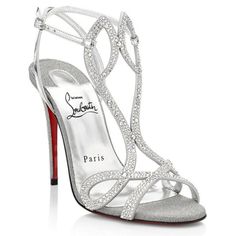 Christian Louboutin Double L Strass 100 Crystal Glitter Sandals Heel Shoes Set High On A Striking Stiletto Heel, The Double L Sandal Features Two Narrow Crossed Straps In A Cursive L Shape. Dressed In Dazzling Crystals, Glitter And Metallic Leather, These Sandals Evoke Regal Elegance. Cl Monogram On The Heels. Leather/Suede/Crystal Upper. Round Open Toe. Adjustable Ankle Strap. Lacquered Leather Sole. Made In Italy. Designer Color: Silver. Size: 39.5 Eu (Insole Measures 10 1/8", Heel: 4") Typica Luxury Silver High Heels, Red Prom Shoes, Cl Monogram, Cursive L, High Heels For Prom, Regal Elegance, Crystal Heels, Sparkly Heels, Glitter Sandals