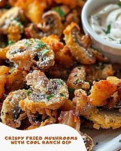 crispy fried mushrooms with cool ranch dip on a white plate, ready to be eaten