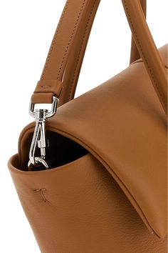 100% Calf Lining: 100% Ovine leather Finishing: 100% Platinum Cognac Leather Bag With Round Handle, Designer Saddle Bag With Removable Pouch In Tote Shape, Designer Saddle Bag Tote With Removable Pouch, Designer Saddle Bag With Removable Pouch For Everyday, Leather Top Handle Bag With Adjustable Strap, Leather Bags With Top Handle And Adjustable Strap, Leather Saddle Tote Bag With Detachable Handle, Modern Leather Saddle Bag With Double Handle, Modern Saddle Bag With Double Handle