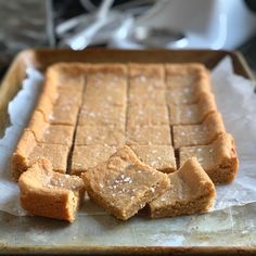 several pieces of cake sitting in a pan