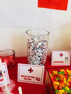 candy bar items displayed on red table with flags