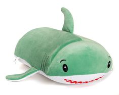 a green stuffed shark pillow on a white background