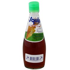 a bottle of syrup on a white background