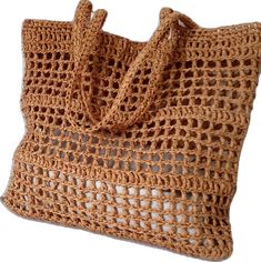 Bohemian Beige Bags With Open Weave, Eco-friendly Brown Bag With Open Weave, Eco-friendly Beige Basket Shoulder Bag, Natural Open Weave Shoulder Bag, Beige Jute Crochet Bag, Beige Crochet Shoulder Bag For Shopping, Brown Open Weave Bag For Everyday Use, Brown Basket Bag With Open Weave, Brown Open Weave Crochet Shoulder Bag