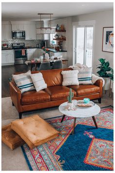 a living room filled with furniture and decor