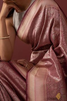 "\nWith its rich floral web of zari, this regal\u00a0saree is truly representative of the royal clothing traditions of India. A luxurious piece of handwoven art!\n\n\n\nColor\u00a0- A\u00a0graceful shade of Pink\n\nTechnique\u00a0- Classic handwoven Banarasi Zari Vasket art passed down through generations.\n\nFabric\u00a0- Soft as butter, pure Katan Silk\n\nSpeciality\u00a0- A beautiful web of zari all over\u00a0the body and a rich border and pallu.\u00a0Age-old Banarasi artistry.\u00a0\n\nExpec Regal Saree, Simple Saree Designs, Mysore Silk Saree, Sarees Wedding, Bengali Wedding, Royal Clothing, Simple Sarees, Desi Fashion Casual, Saree Designs Party Wear