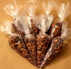 several bags of nuts are wrapped in plastic