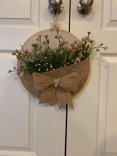 the door is decorated with flowers and burlocks