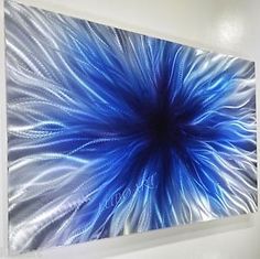 an abstract painting with blue and white colors