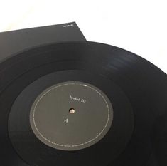 two black records sitting on top of each other