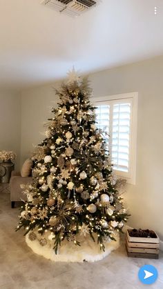 a decorated christmas tree in a living room