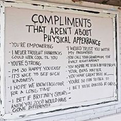 a sign on the side of a building that says compliments that aren't about physical appearance