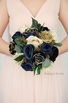 a bride holding a bouquet of flowers in her hands