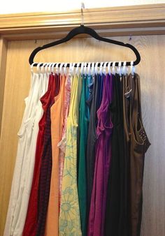 an image of clothes hanging on a rack