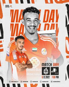 a man holding a soccer ball in front of an orange and white poster with the words match day on it