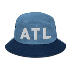 Here’s a custom ATL denim bucket hat. The letters ATL are embroidered on the front. Represent Atlanta, GA in style when your running errands or out on the town. Here’s some more details about your hat: • 100% cotton • 2 sewn eyelets on each side of the hat • Poplin sweatband • One size fits most Atl Georgia, Denim Bucket Hat, Out On The Town, Light Denim, Atlanta Ga, Running Errands, Bucket Hat, Atlanta, Georgia