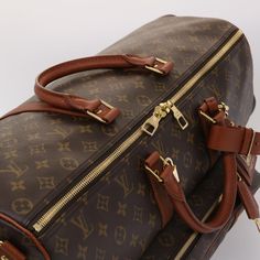 Brand: Louis Vuitton Model: Monogram NBA Gym Bag Boston Bag Color: Brown Material: Canvas Inclusions: Dust Bag / Item Box / Padlock / Key×2 / Clochette / Name Tag / Shoulder Strap Dimensions: W65cm x H35cm x D29cm Serial number: NA Country of origin: Italy Condition: AB - good condition. The Louis Vuitton Brown Monogram NBA Gym Bag in Monogram Canvas exudes sporty elegance and luxury. Crafted from the iconic Monogram canvas adorned with the NBA logo, this Boston Bag showcases Louis Vuitton's com Luxury Large Capacity Tan Shoulder Bag, Luxury Tan Satchel With Large Capacity, Designer Tan Travel Bag, Luxury Large Capacity Tan Satchel, Monogram Canvas Shoulder Satchel For Travel, Luxury Monogram Canvas Rectangular Bag, Luxury Large Capacity Pouch Bag, Luxury Rectangular Monogram Canvas Bag, Luxury Top Handle Travel Bag For Errands