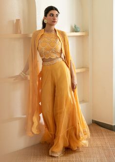 Editor's Note Featuring Sunshine Yellow Sharara Set Fabric: Silk Organza, Crepe Color: Yellow Embroidery Details: Zardozi Hand Embroidery Care: Dry Clean Only   About the Designer Mani Bhatia&#... Yellow Sharara Set, Yellow Sharara, Sharara Designs, Cape Set, Haldi Outfits, Haldi Outfit, Function Dresses, Trendy Outfits Indian, Mehendi Outfits