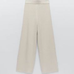 Nwt Zara Ecru Flared Wool Blend Knit Pants Brand New Zara Flared Knit Pants In Ecru High-Waisted, Wide-Leg Pants W/ Elastic Waistband & Side Slits At Hem Mixture Of Viscose (52%), Wool (23%), Polyamide (20%) & Cashmere (5%) Thanks For Looking!!! White Knit Wide Leg Pants, White Knit Wide-leg Pants, Cream Wide Leg Winter Pants, Cream Wide Leg Pants For Winter, Beige Knit Pants For Fall, Fitted Knit Beige Bottoms, Elegant Knit Bottoms For Winter, Fitted White Knit Bottoms, Fall Knit Beige Pants