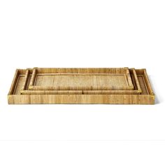 a bamboo tray with two compartments and handles on the bottom, in front of a white background