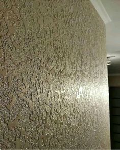 the wall is covered in some kind of textured paint that looks like it has been painted