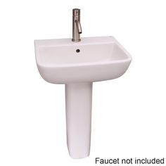 a white pedestal sink on a white background