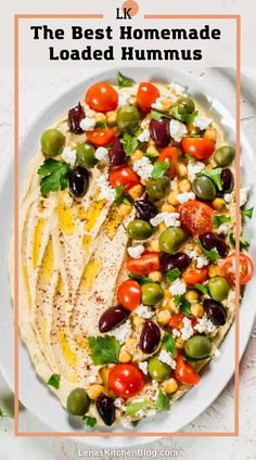 the best homemade loaded hummus recipe on a white plate