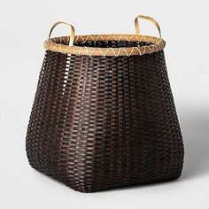 a brown basket with handles on it