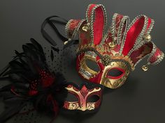 A polarizing combination where the man wears the red/gold Jester mask and the woman looks elegant in the red/gold Venetian mask, which comes attached with feathers and a flower. Mask Ball Party, Masquerade Mask Women, Jester Mask, Gold Masquerade Mask, Mask Ball, Dr Browns, Party Mask, Ball Party, Venetian Mask