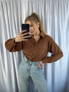 - Vintage cowboy style brown women's shirt, western style blouse - Good vintage condition  - TAG SIZE: 40 - Fabric information: 95% polyester, 5% elastane Estimated to fit XS-S-M-L  based on your desired fit. Measurements (laying flat): - Shoulders (back): 47 cm - Length: 75 cm - Sleeve: 57 cm - Armpit to armpit: 54 cm Vintage clothes may come with minor flaws due to pre-loved wear. But most importantly it is a one-of-a-kind piece with its own character. By shopping secondhand you're giving a se Brown Long Sleeve Tops With Pockets, Brown Long Sleeve Shirt With Pockets, Fall Long Sleeve Blouse For Rodeo, Fall Rodeo Long Sleeve Blouse, Brown Work Shirt With Pockets, Western Style Tops With Button Closure For Fall, Casual Rodeo Fall Blouse, Brown Button-up Shirt With Pockets, Casual Fall Blouse For Rodeo