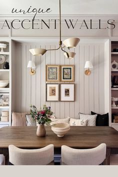 a dining room table with chairs and pictures on the wall above it that says vintage accent walls