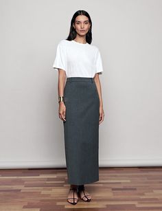 FINAL SALE Grey melange maxi fitted skirt. Brand Pixie Market63% polyester/20% rayon/15% wool/2% spandexFully lined, Belt loopsHidden back zipBack ventSize xsmall waist 24" , hips 34", length 36"Size small waist 26" , hips 36" length 37"Size medium waist 28", hips 38", length 37"Size large waist 30", hips 40", length 38"Model is wearing a size small Dry Clean onlyImported