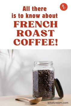 a jar filled with coffee beans sitting on top of a table