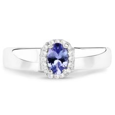 "Tanzanite Ring, Natural Tanzanite and White Zircon Halo Ring in Sterling Silver Ring, Tanzanite Promise Ring, December Birthstone Flaunt yourself with this tanzanite & white zircon halo ring. The natural gemstones have a combined weight of 0.54 carats and are set in .925 sterling silver with rhodium plating. The soft violet hue of this ring adds a pop of color to any look! The understated design and vibrant stones make this ring perfect for every occasion. .925 Sterling Silver Stone Details Gift Tanzanite Ring With Halo Design, Tanzanite Halo Promise Ring, Tanzanite Halo Design Ring For Gift, Tanzanite Halo Design Ring As Gift, December Jewelry, Cluster Earrings Studs, 14k Gold Ruby Ring, Cocktail Bracelet, Tanzanite Bracelet