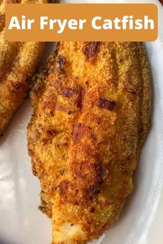 an air fryer catfish is on a plate with some breaded crusts