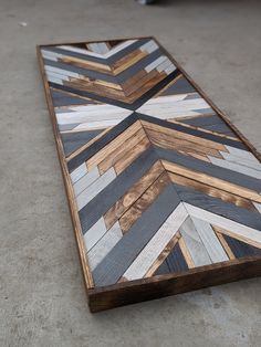 a wooden bench made out of strips of wood