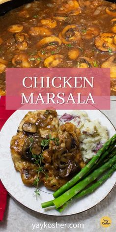 chicken marsala with mashed potatoes and asparagus on a white plate next to a red napkin