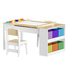 a child's desk and chair with colored blocks on it