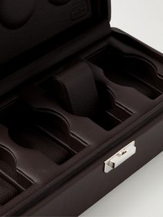 Scatola Del Tempo's watch boxes are a work of art. This version has been crafted in Italy from supple full-grain leather with four sections that are ergonomically designed to cradle each timepiece. Keep it displayed on your dresser so you can rotate through your favourites during the week. Classic Rectangular Case Watches For Formal Occasions, Classic Formal Watch With Rectangular Case, Classic Formal Watches With Rectangular Case, Formal Brown Watch Accessories With Rectangular Dial, Luxury Business Watch Accessories With Rectangular Case, Rectangular Brown Watch Case For Business, Formal Leather Watch With Round Case, Brown Rectangular Watch Case For Formal Occasions, Brown Business Watch With Round Case