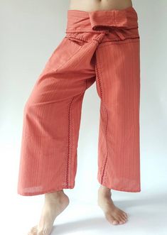 "Unisex Thai fisherman pants. One size fits all. You can wear in many occasions, casual wear, yoga wear, maternity wear, relax at home, travel etc. If you are looking for some pants that you can wear everywhere, comfortable, relax and Easy to wear. Thai fisherman pants is Answer!! Nice gift for yourself or your lover One pocket on the side for storing your items such as wallets, mobile phones, etc Approx. Measurements: One size can fits most and 1 Pockets Measurement Waist 27\" (69 cms) Length 4 Spring Cotton Yoga Pants, Cotton Yoga Parachute Pants, Cotton Parachute Pants For Yoga, Cotton Parachute Yoga Pants, Spring Cotton Yoga Bottoms, Spring Yoga Bottoms In Cotton, High Waist Cotton Harem Pants For Beach, High Waist Cotton Yoga Pants With Pockets, Summer Cotton Wide Leg Yoga Pants