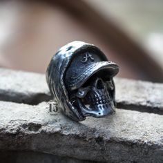 Handmade Rock n roll jewelry like you've never seen before. Grab yours NOW or cry later. Best attention to detail. Article name : RAP BOY Environmentally friendly metal made with passion and great attention to detail 🔨 Very comfortable to wear daily and in any occasion 🖤💍 Shipped from Jakarta, Indonesia Standard shipping use USPS ( US Customers ) Singapore post ( Rest of the world ) Express shipping use DHL Express Note : Please put a phone number in a note for DHL Express, it needs to requir Adjustable Silver Skull Ring Punk Style, Adjustable Silver Skull Ring In Punk Style, Collectible Hand Cast Skull Rings, Symbolic Metal Skull Ring For Collectors, Engraved Metal Skull Ring As A Gift, Handmade Metal Skull Ring Collectible, Collectible Skull Jewelry In Lost Wax Casting, Adjustable Silver Skull Ring Collectible, Adjustable Vintage Metal Skull Ring