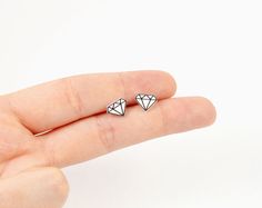 Handmade “Diamond” stud earrings. Sealed with a clear finish. Water resistant but not waterproof. Not recommended in the shower, pool, etc. Earrings measure approx. 9 mm x 7 mm.  ✓ Sensitive Ears ✓ Hypoallergenic ✓ Nickel-Free  Our earrings are made with Titanium earring posts with Stainless Steel flat pads & Stainless Steel butterfly nut backs. They are Hypoallergenic and Nickel-Free. Perfect for those with sensitive ears, nickel allergies and those in Europe, where jewelry is legally requi... Silver Earrings With Diamond Markers As Gift, Nickel Allergy, Titanium Earrings, Earrings Diamond, Earring Posts, Diamond Stud Earrings, Hypoallergenic Earrings, Sketch Drawing, Diamond Stud